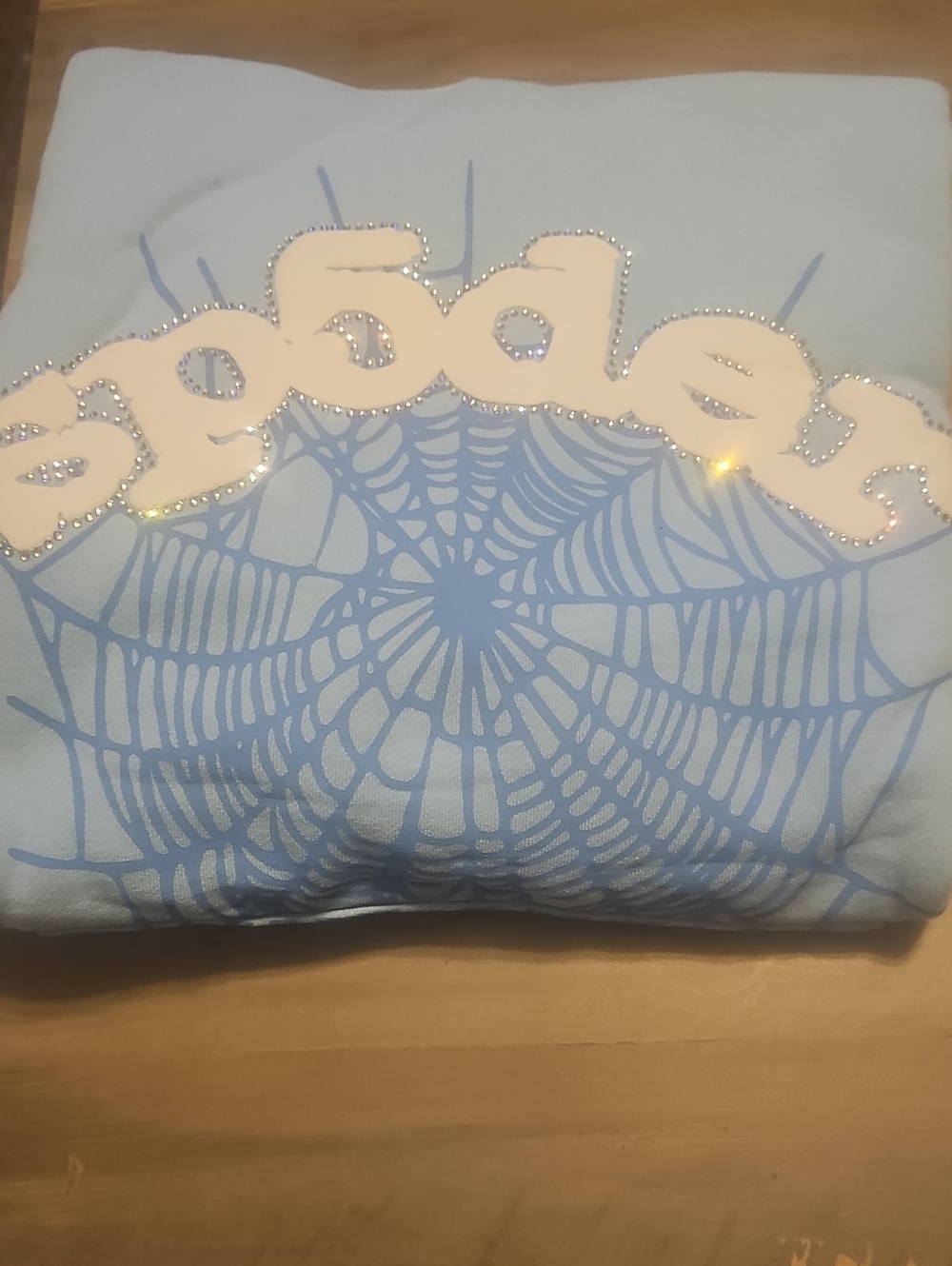 Light Blue Graphic Pullover Sweatshirt with Rhinestone Logo Accent